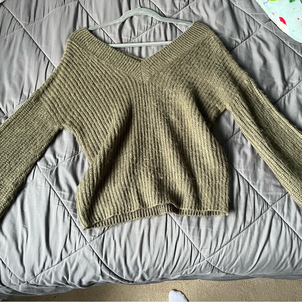 Green Boscovs sweater.